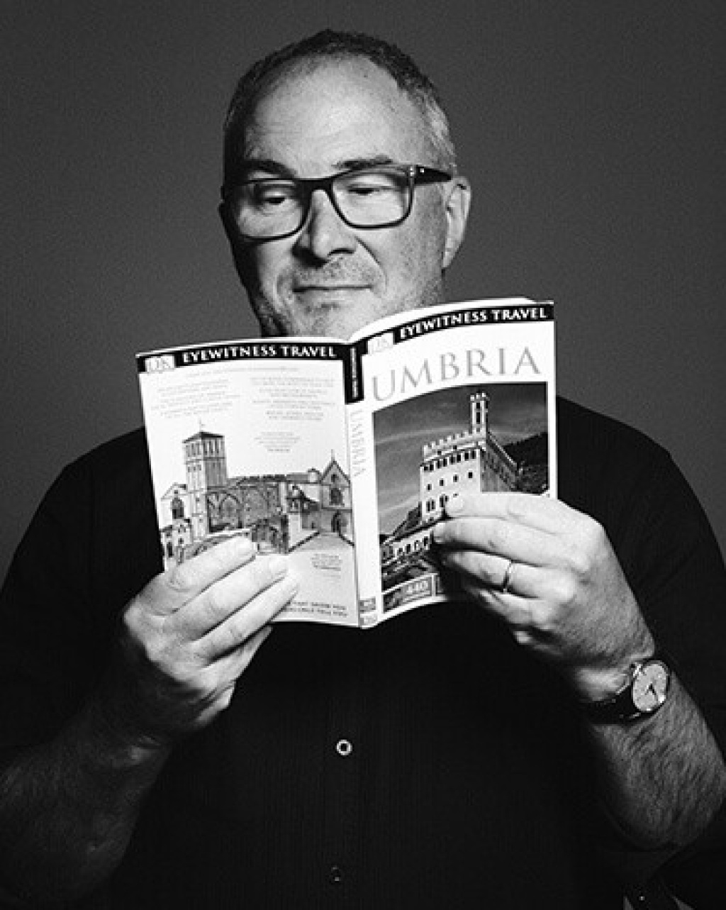 Internationally awarded David Ormston reading expert copywriting book.