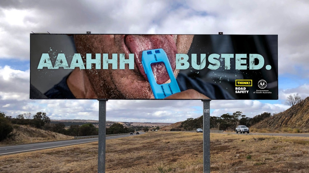 AHHH BUSTED Billboard with drug test for SAPOL behaviour change campaign.