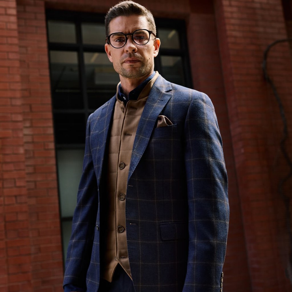 Man in vest and suit for Social Media content.
